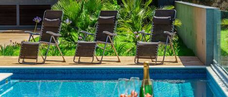Outdoor pool, pool loungers