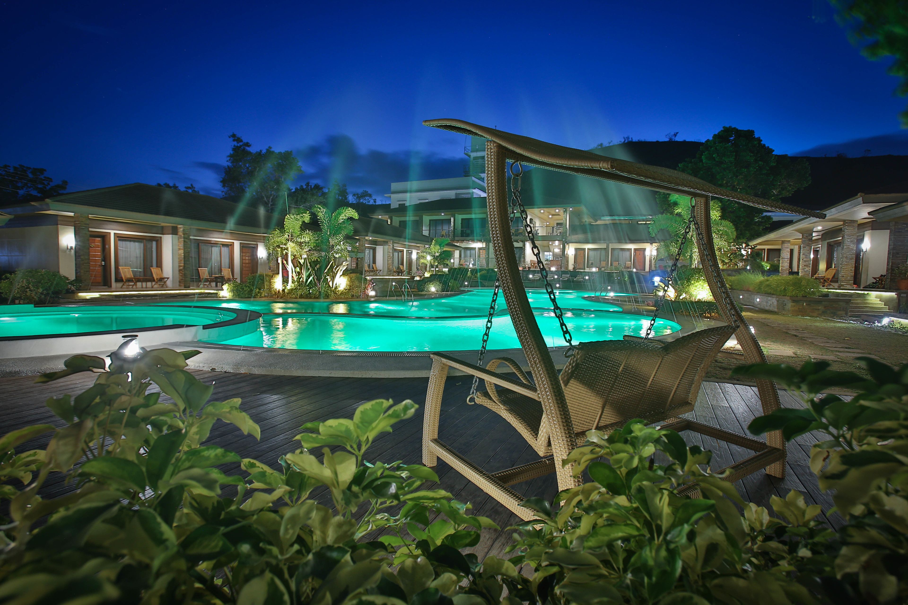 outdoor pool, pool umbrellas, pool loungers