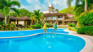 Outdoor pool, pool umbrellas, pool loungers