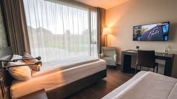 Habitación estándar con 2 camas individuales | Ropa de cama de alta calidad y caja de seguridad en la habitación