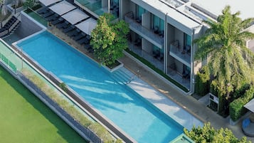 Outdoor pool, open 7:00 AM to 7:00 PM, pool umbrellas, pool loungers