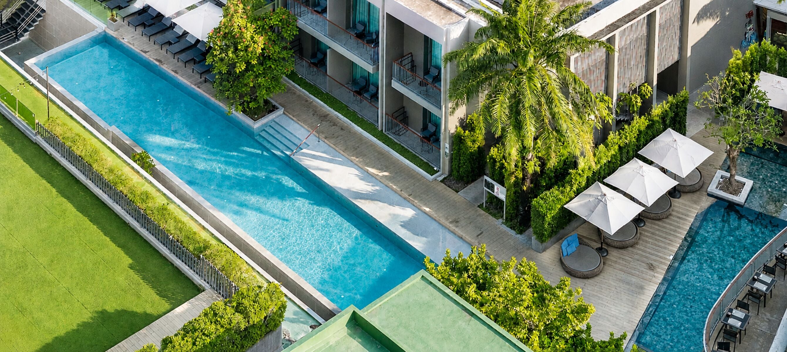 Outdoor pool, open 7:00 AM to 7:00 PM, pool umbrellas, sun loungers