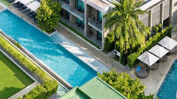 Outdoor pool, open 7:00 AM to 7:00 PM, pool umbrellas, sun loungers