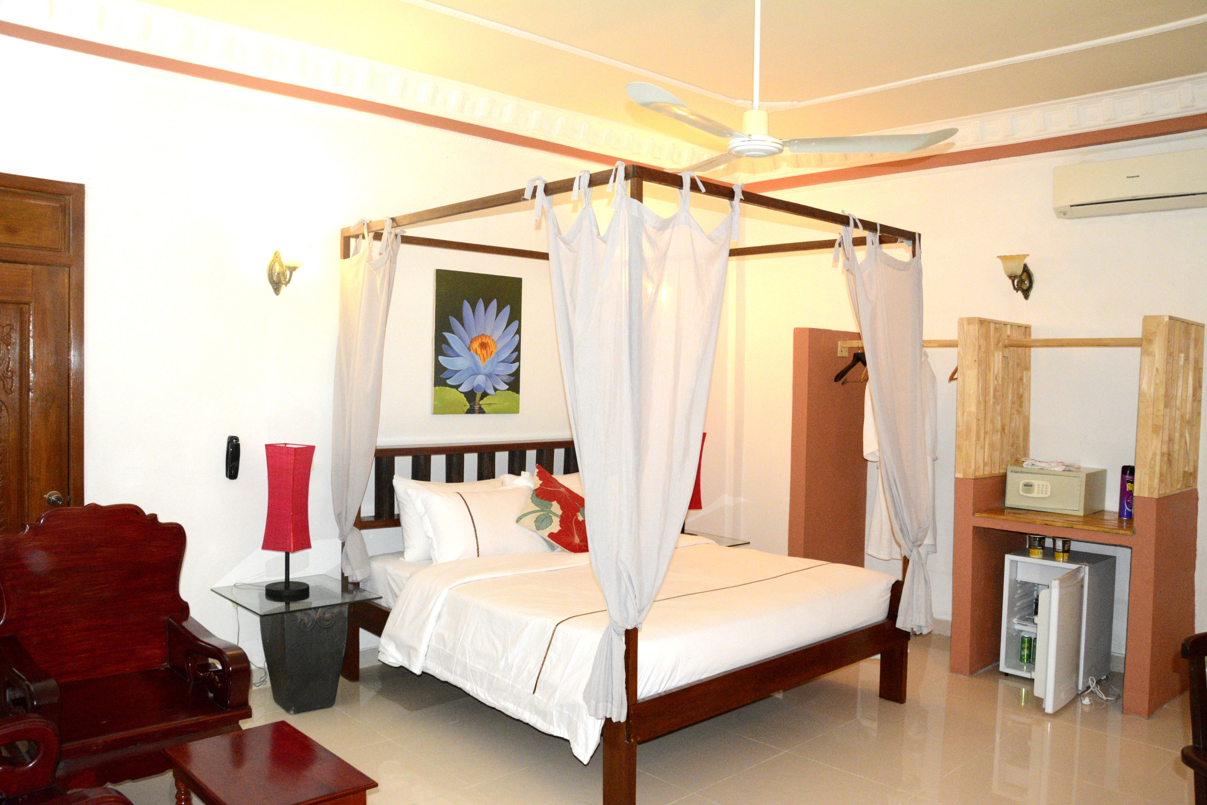 deluxe single room, 1 bedroom, hill view | minibar, in-room safe, desk, iron/ironing board