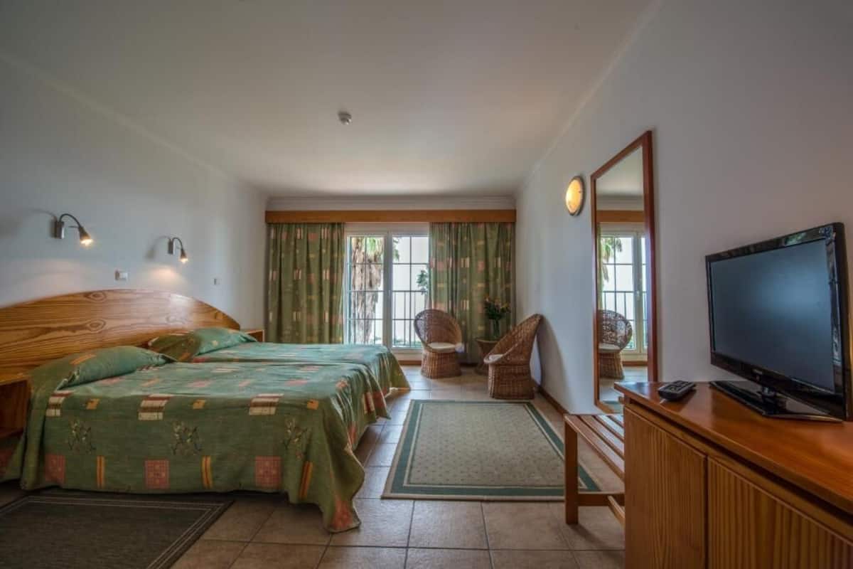 Desk, blackout drapes, WiFi (free), bed sheets