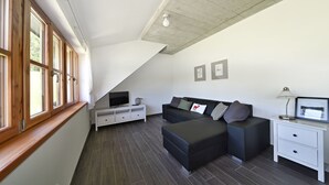 Classic Suite, 2 Bedrooms | Living area | 70-cm flat-screen TV with digital channels, TV, heated floors - Residence Jelení Boudy (Spindleruv Mlyn)