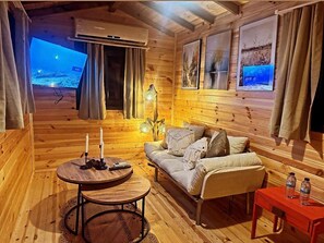 Casa de árbol de diseñador | Área de sala de estar