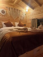 Design Tree House | Desk, laptop workspace, blackout drapes, free WiFi