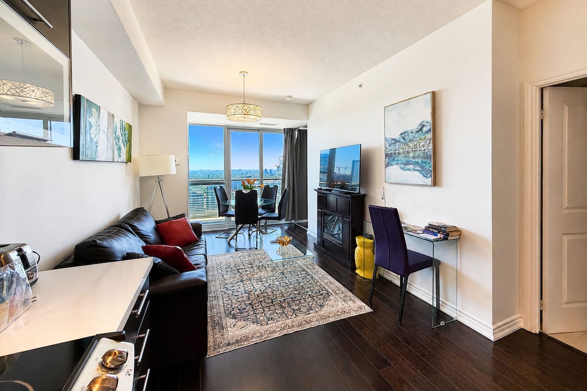 Superior Suite, 2 Bedrooms, Kitchen, City View | Living area | 50-inch flat-screen TV with cable channels, TV, Netflix