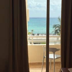 Deluxe Room, Partial Sea View | Beach/ocean view