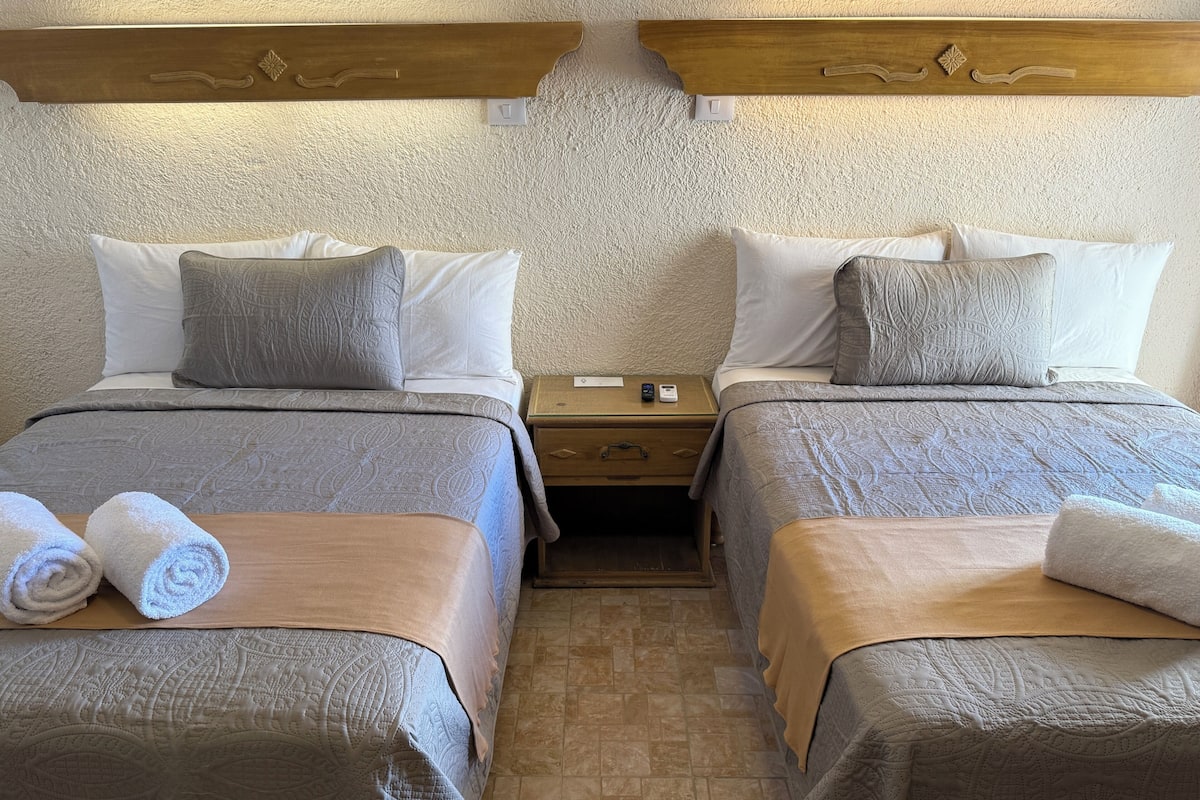 Deluxe Double Room | 1 bedroom, in-room safe, blackout drapes, iron/ironing board