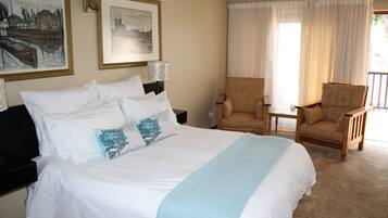 Chambre Standard, 1 grand lit | Coffres-forts dans les chambres, décoration personnalisée