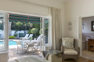 Deluxe Room, 1 Bedroom | Living area | Plasma TV