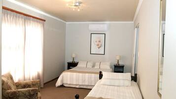 Family Room, 1 Bedroom | 1 bedroom, desk, soundproofing, iron/ironing board