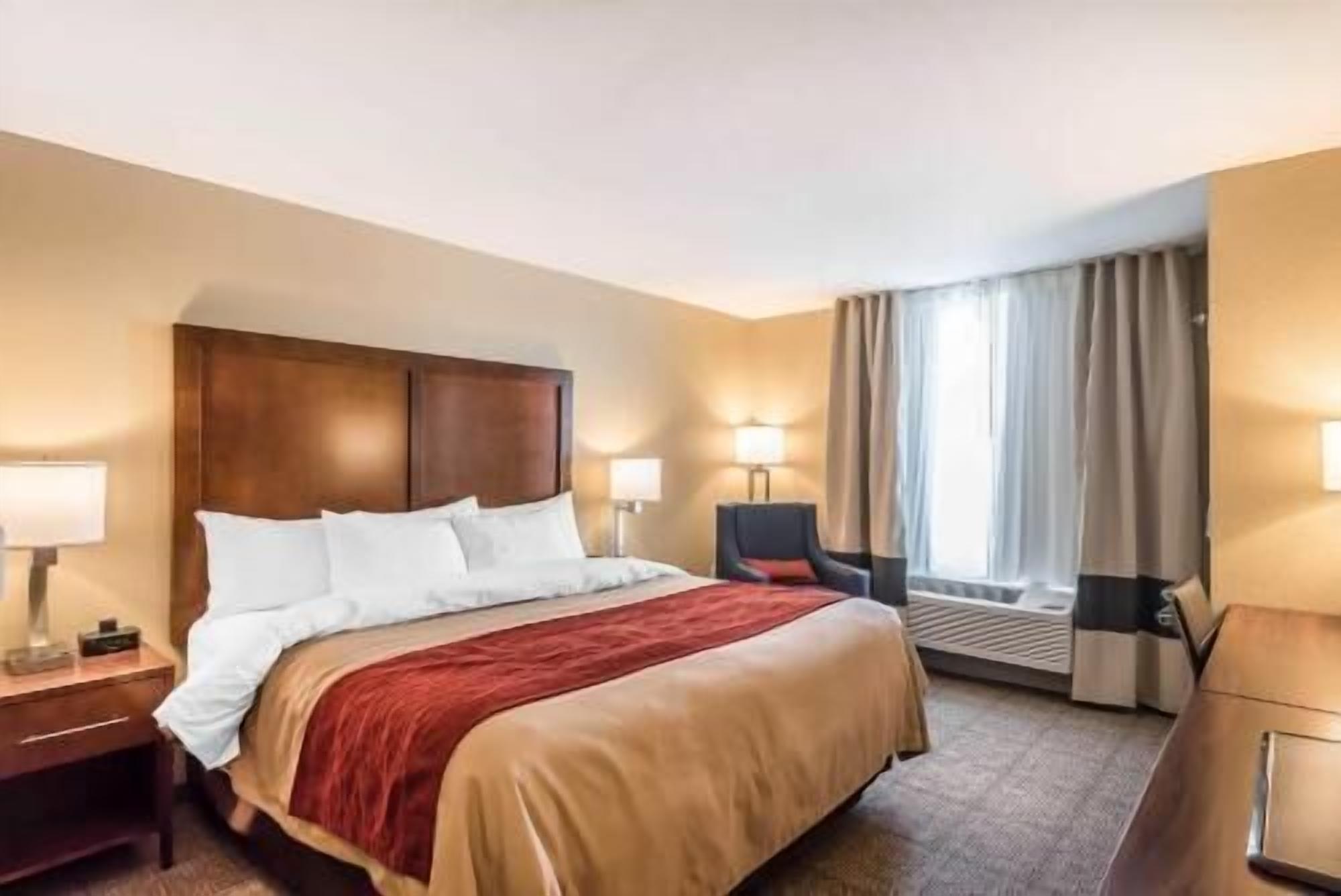 Pillow-top beds, desk, laptop workspace, blackout curtains