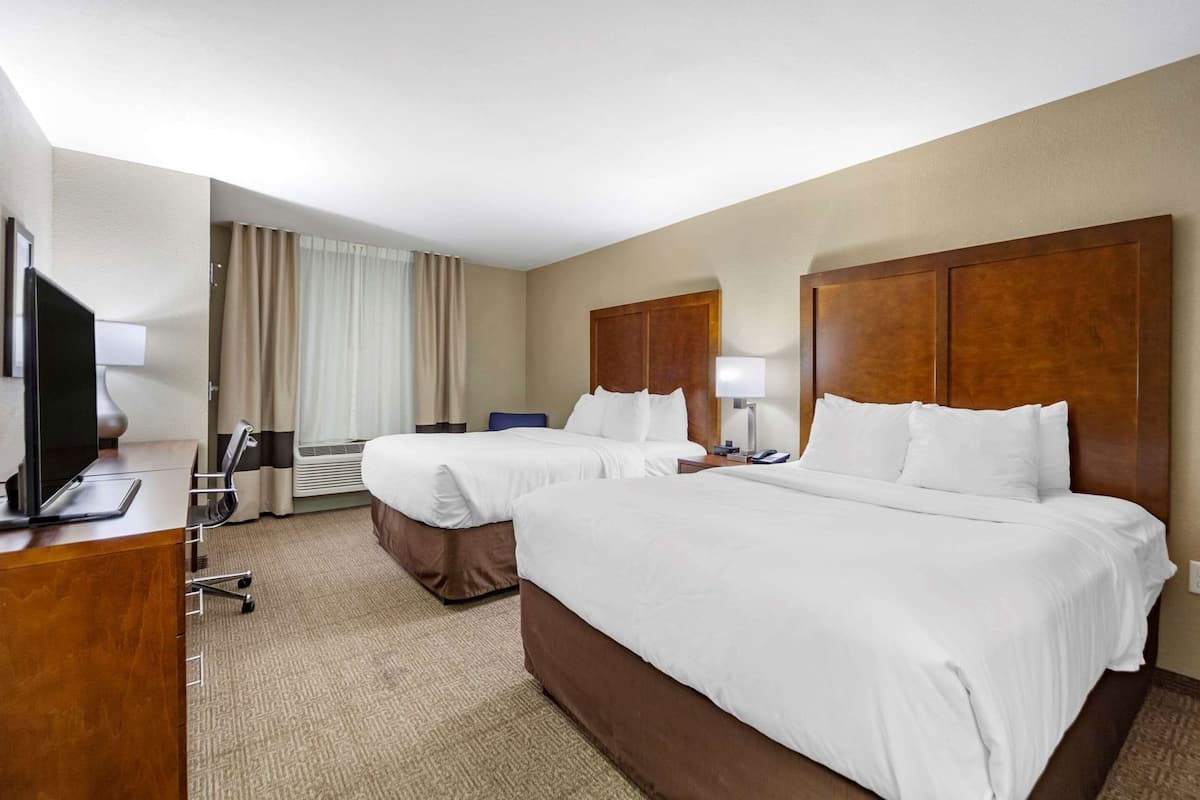 Pillow-top beds, desk, laptop workspace, blackout curtains