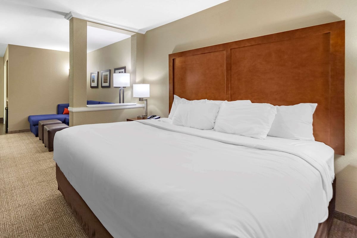 pillow-top beds, desk, laptop workspace, blackout curtains