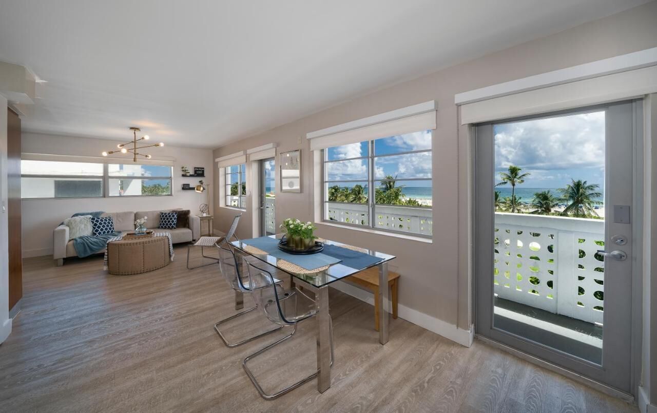 Panoramic King Suite, Direct Ocean View w/Balcony | Living area | 42-inch flat-screen TV with cable channels, TV