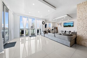 Luxury Penthouse, 3 Bedrooms, Balcony, Ocean View | Living area | Plasma TV, table tennis