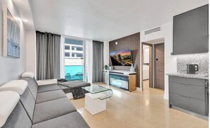 Luxury Apartment, 2 Bedrooms, Balcony, Ocean View | Living area | Plasma TV, ping pong