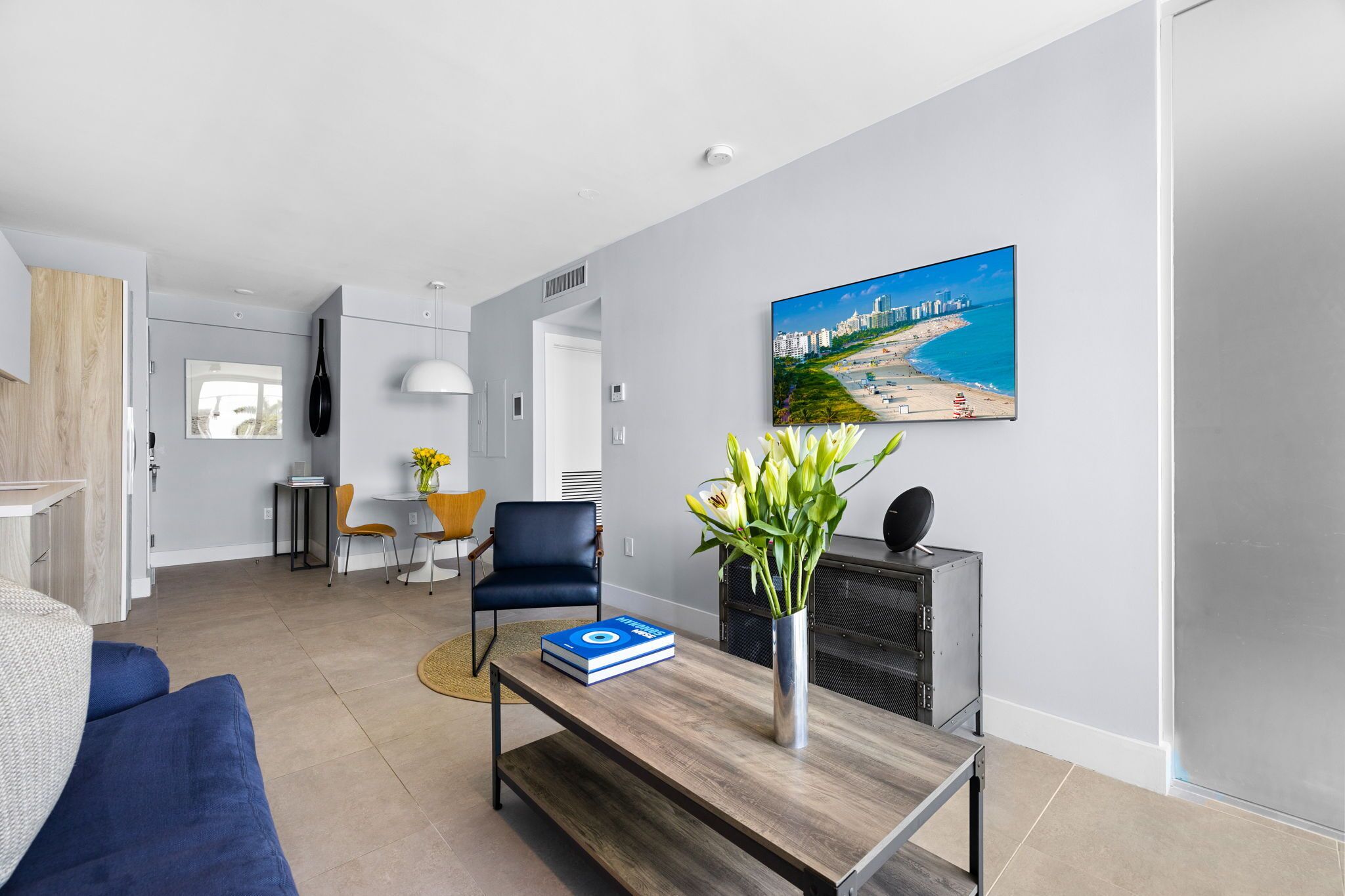 signature room, 1 king bed with sofa bed | living area | 45-inch flat-screen tv with cable channels, tv, ipad