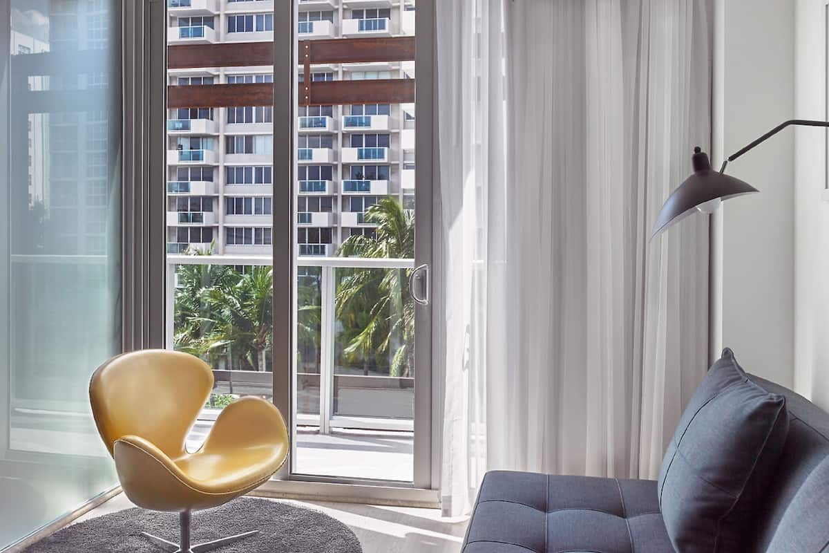 Skyline One Bedroom Suite - With Balcony | Living room | 45-inch flat-screen TV with cable channels, TV, iPad