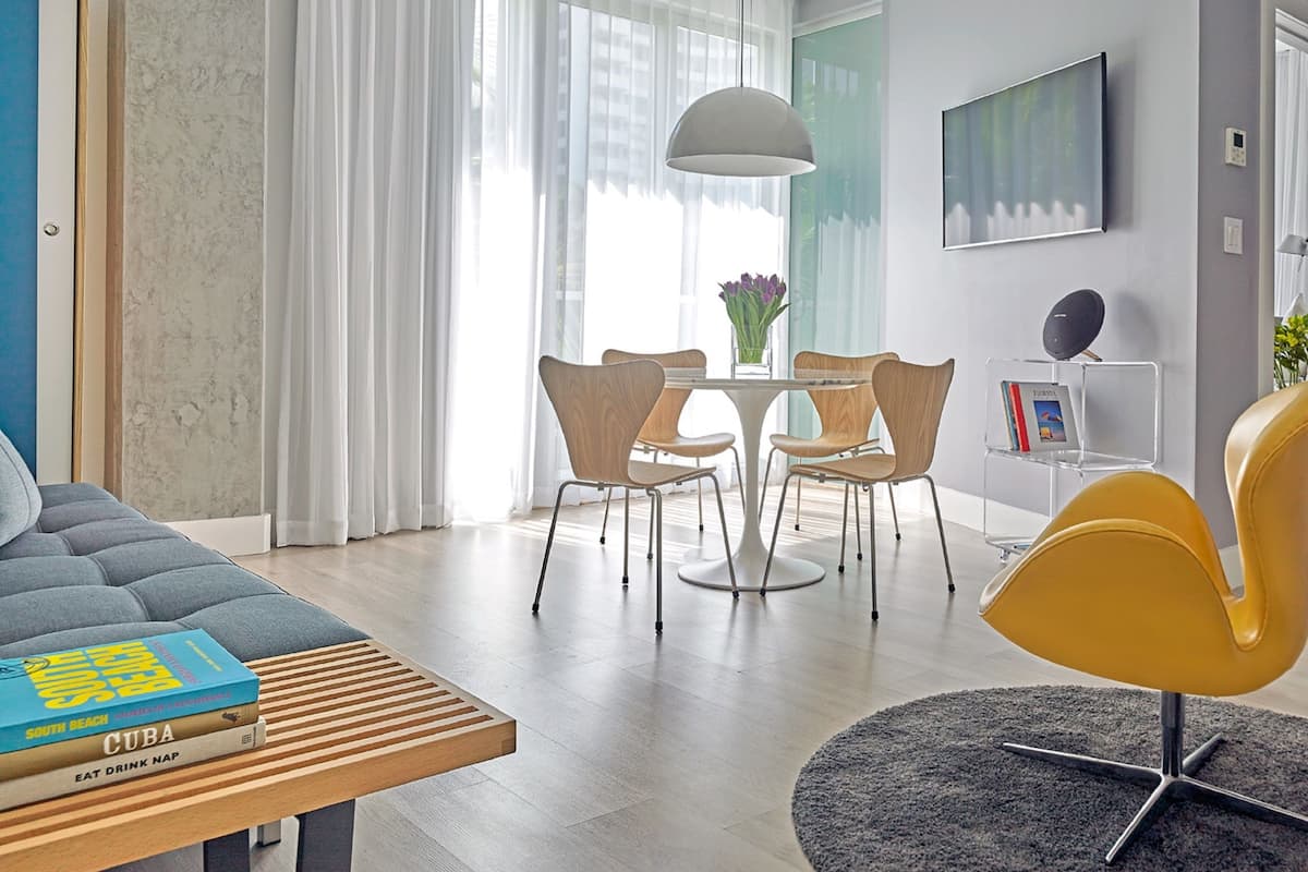 Corner One Bedroom Suite - With Standing Balcony | Living room | 45-inch flat-screen TV with cable channels, TV, iPad