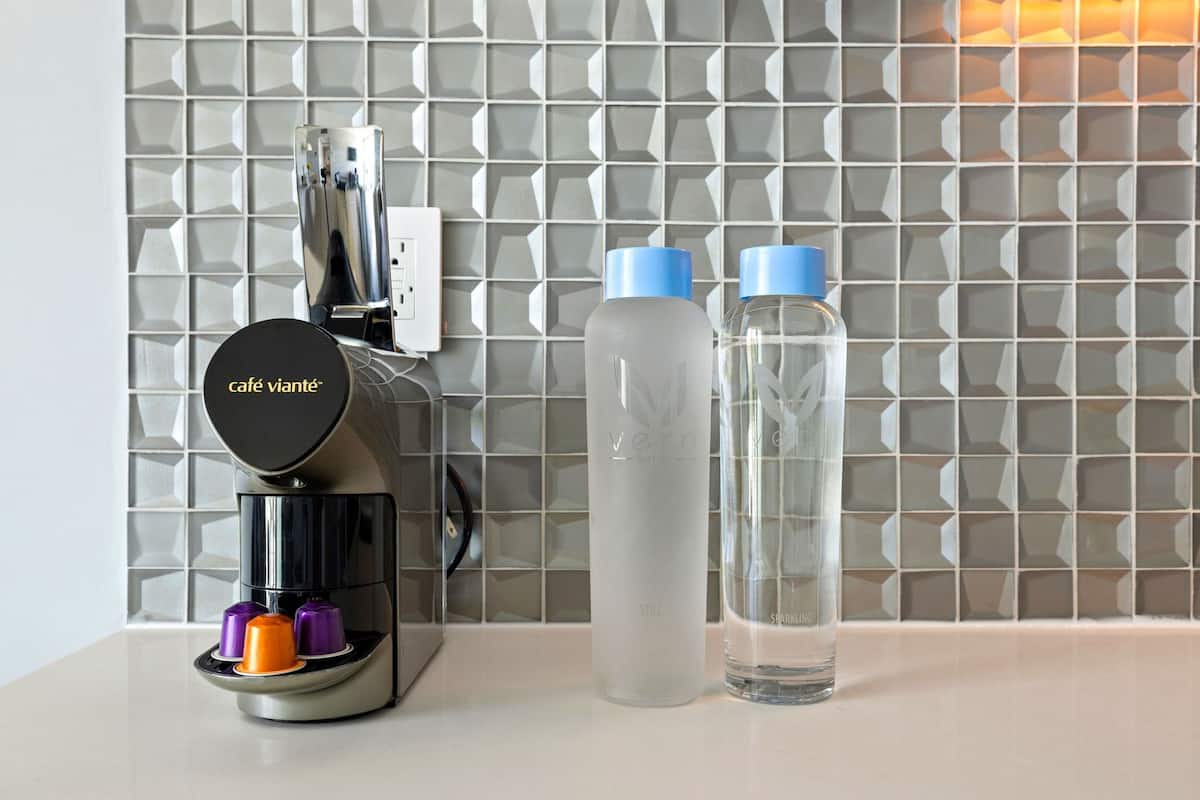 signature room, 1 king bed with sofa bed | coffee and/or coffee maker