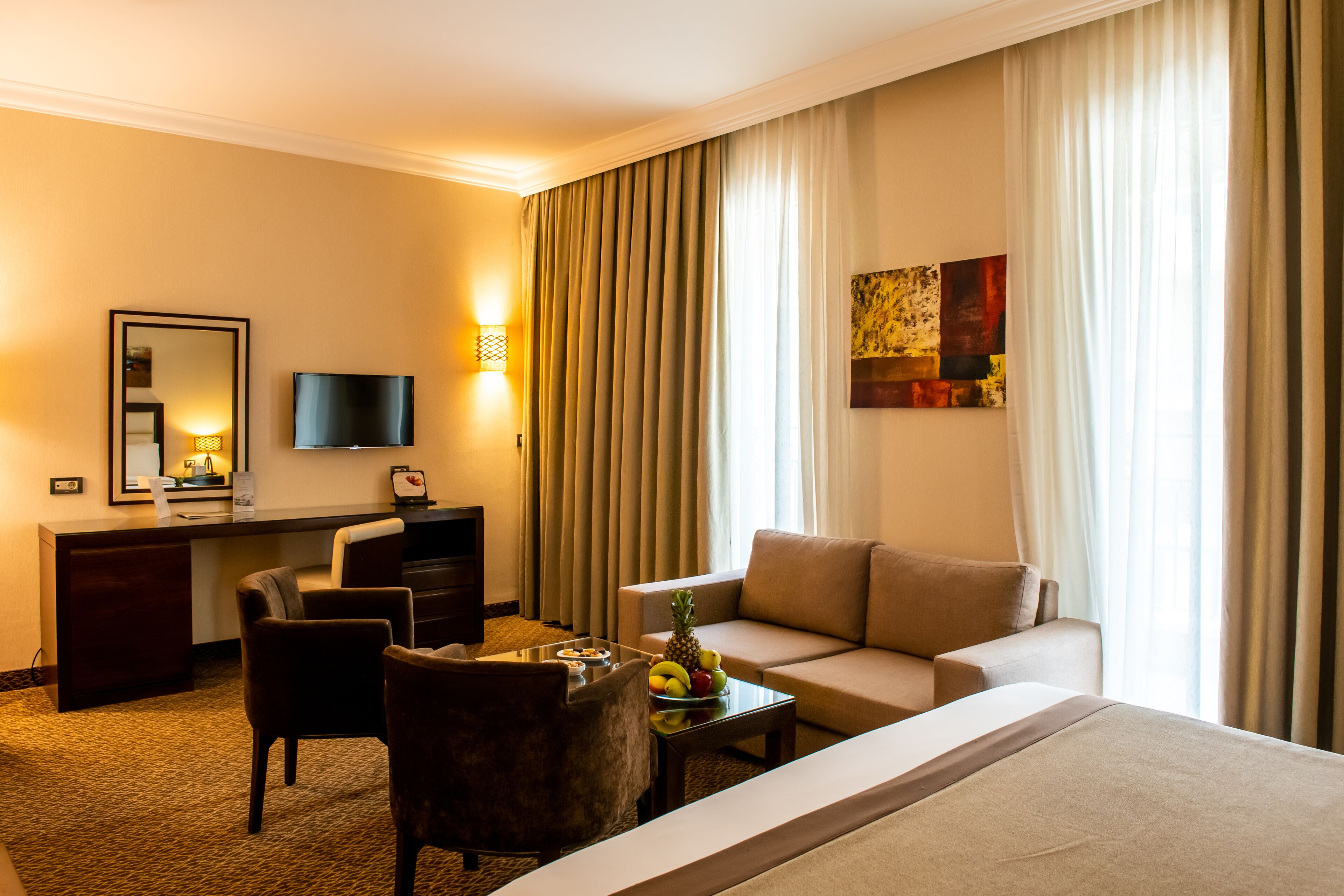 Superior Suite | Living area | 40-inch LCD TV with cable channels, TV