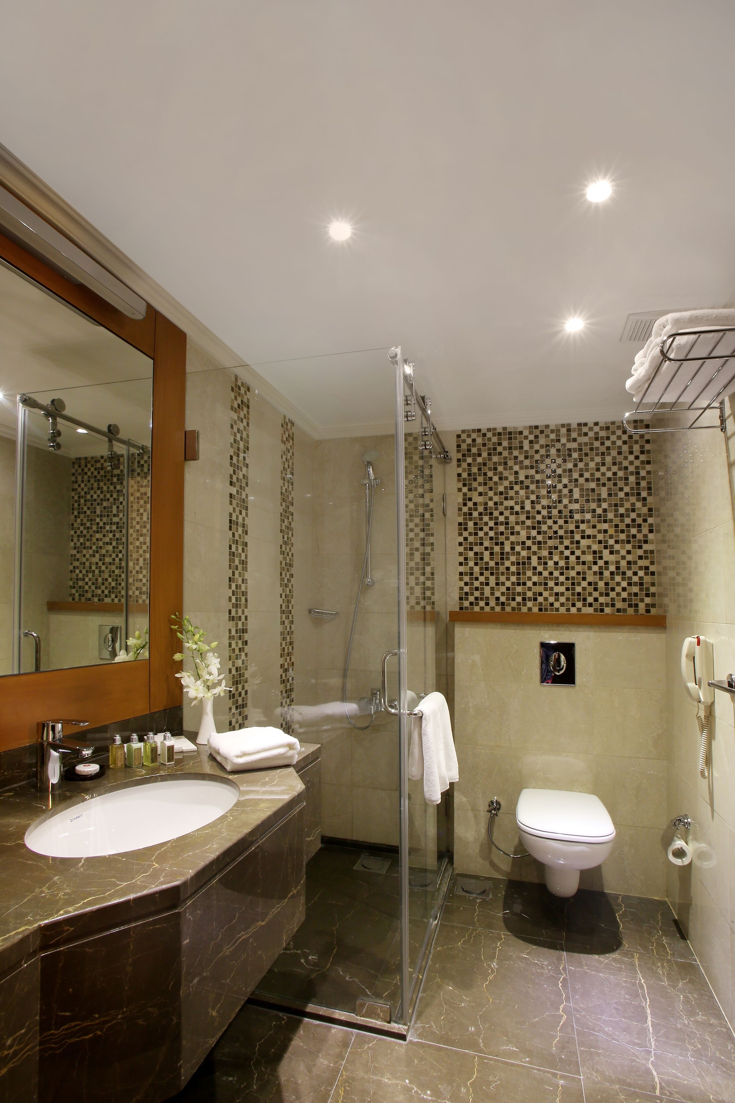 deep-soaking bathtub, free toiletries, hair dryer, bathrobes