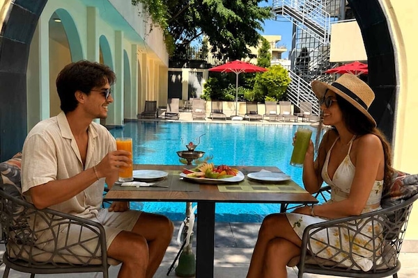 Seasonal outdoor pool, open 10:00 AM to 7:00 PM, pool loungers