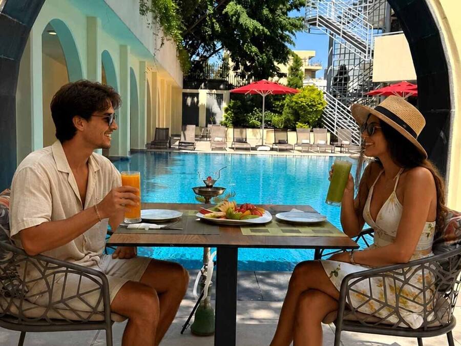 Seasonal outdoor pool, open 10:00 AM to 7:00 PM, sun loungers