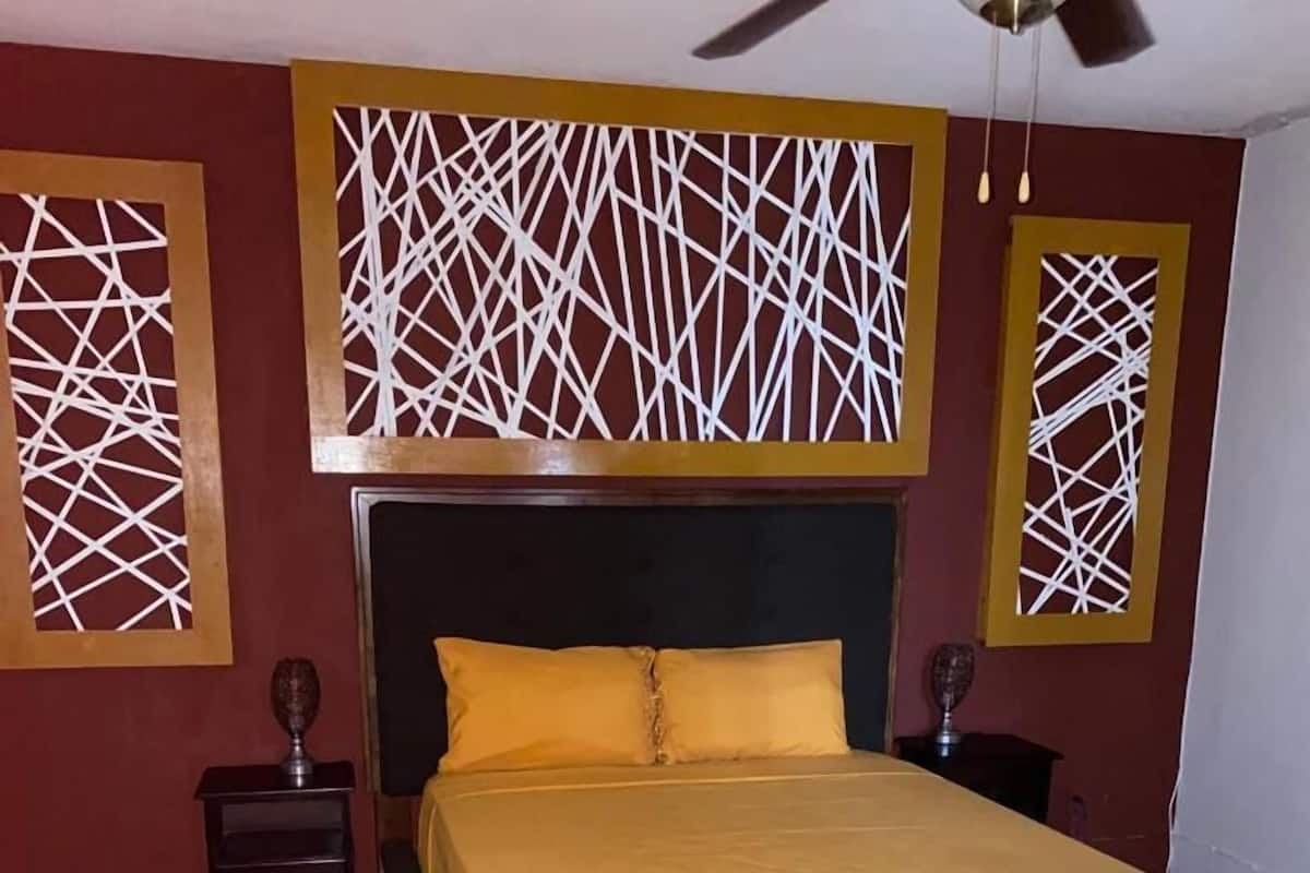Premium Room, 1 Queen Bed | Individually furnished, desk, blackout drapes, iron/ironing board