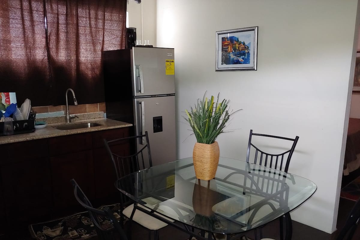 Family Quadruple Room, 2 Queen Beds | Private kitchen | Fridge