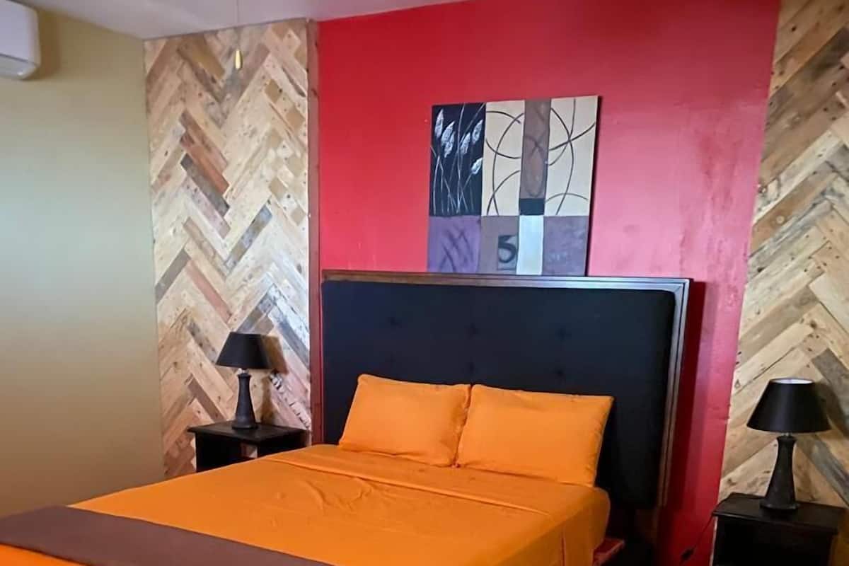 Comfort Studio Suite, 1 Queen Bed | Individually furnished, desk, blackout drapes, iron/ironing board