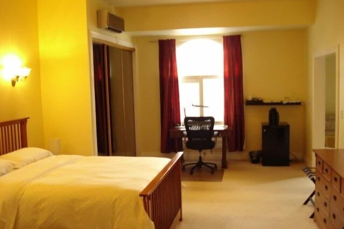 Orchid Suite, 1 King Bed and 1 Sofa Bed, Fireplace, Jetted Tub | 2 bedrooms, soundproofing, iron/ironing board, free WiFi