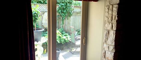 Patio Suite, 1 King Bed and 1 Queen Bed, Fireplace, Kitchenette | Terrace/patio