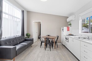 Villa, 2 Bedrooms (Sleeps 5; 1 Queen and 1 Tri-bunk) | Living area | Flat-screen TV - Lifestyle Villages Redhead (Newcastle)