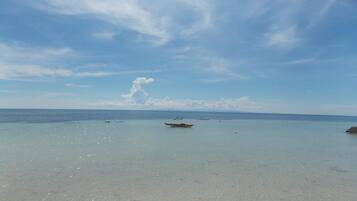 On the beach, sun loungers, snorkeling, kayaking