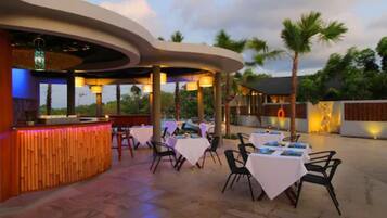 Breakfast, lunch, dinner served; international cuisine, pool views