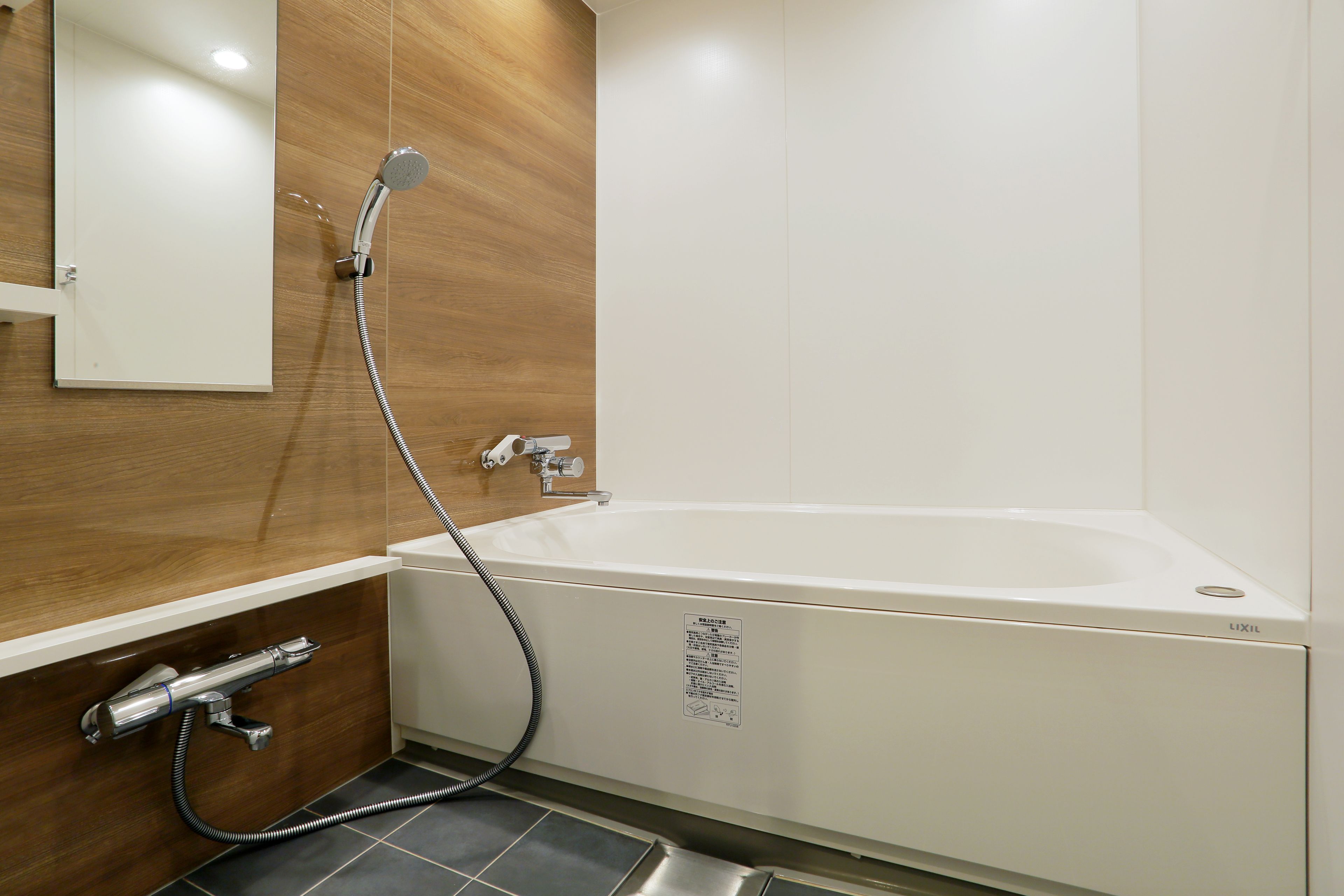 shower, hair dryer, slippers, electronic bidet