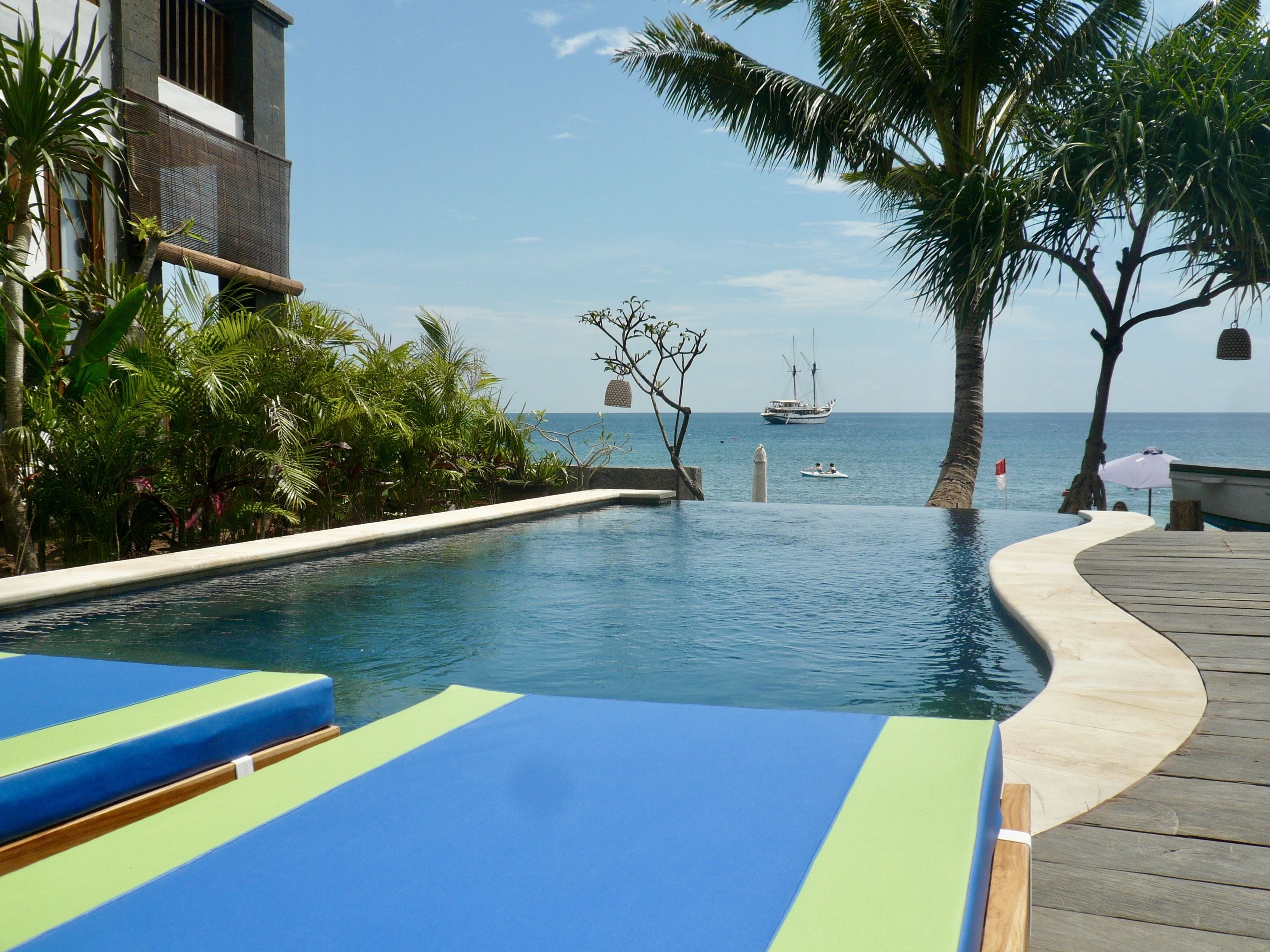 outdoor pool, pool umbrellas, pool loungers