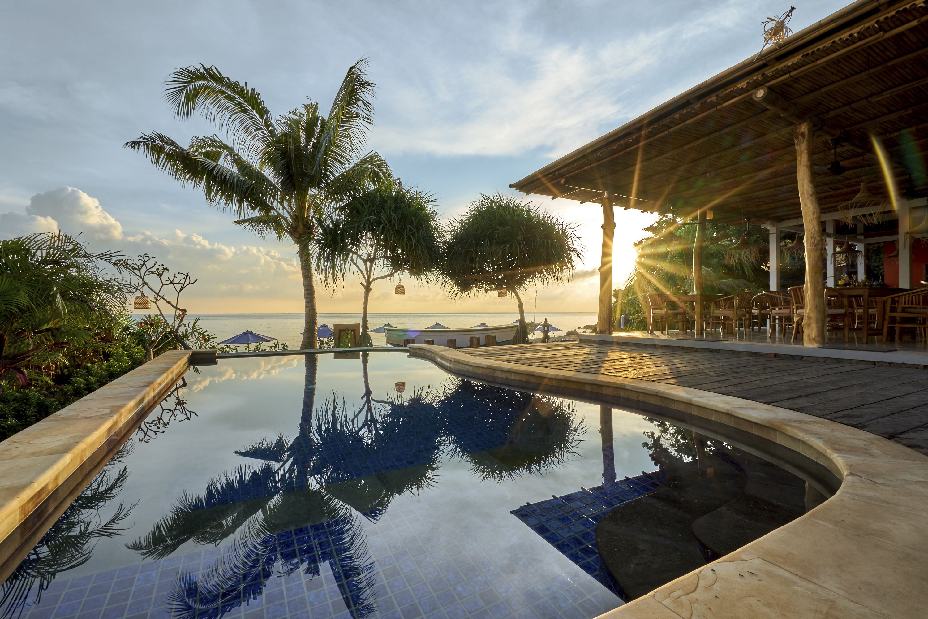 Outdoor pool, pool umbrellas, sun loungers