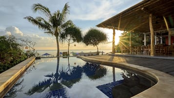 Outdoor pool, pool umbrellas, pool loungers