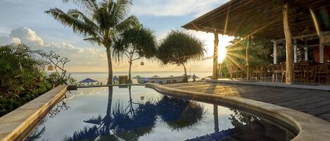 Outdoor pool, pool umbrellas, sun loungers