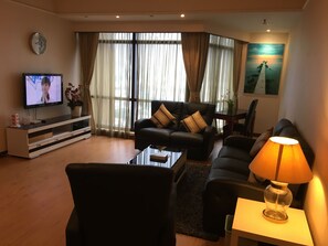 Deluxe Apartment, 2 Bedrooms, City View | Living area | LCD TV, DVD player - Classic Service Suite at Times Square (Kuala Lumpur)