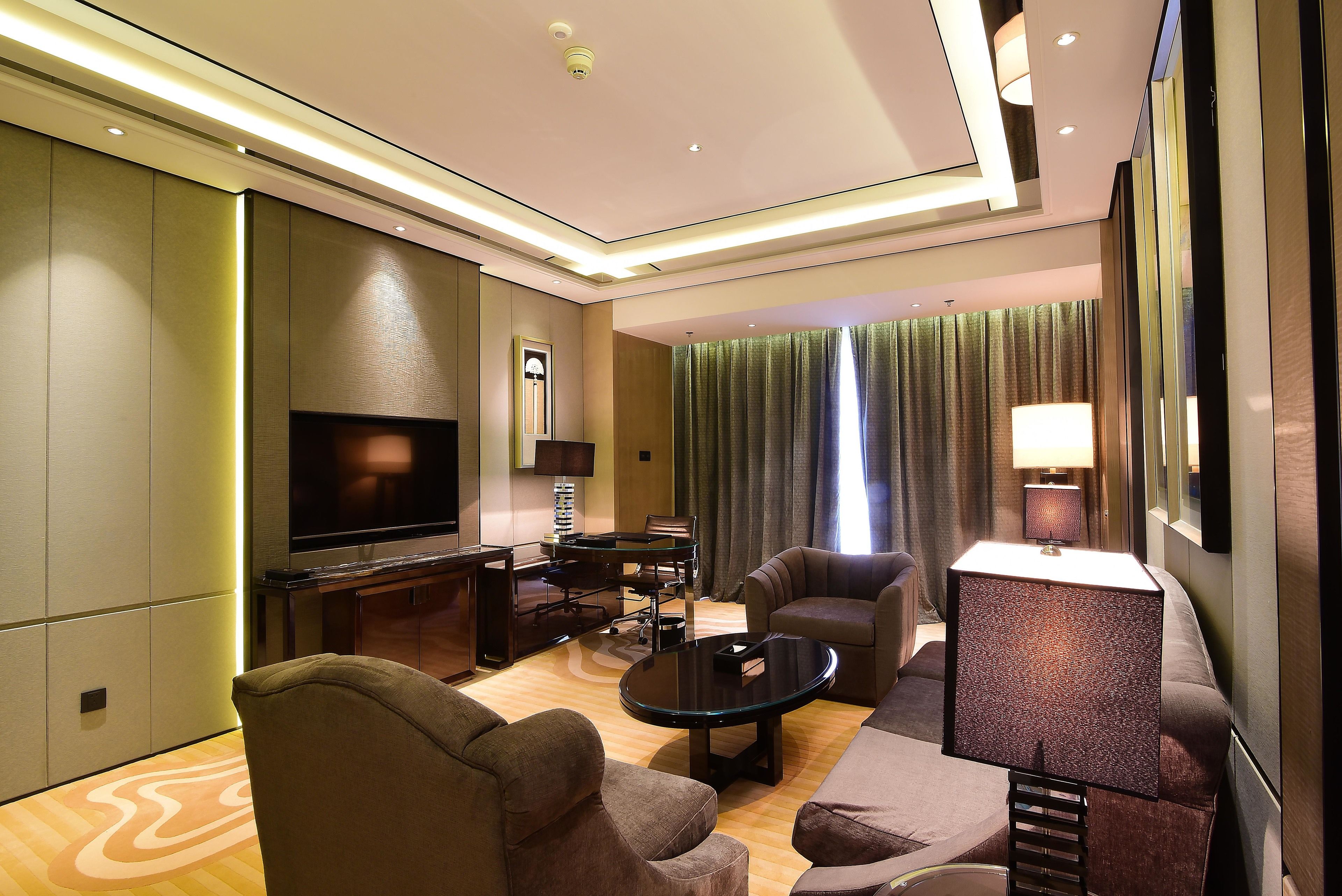 deluxe suite | premium bedding, down duvets, minibar, in-room safe