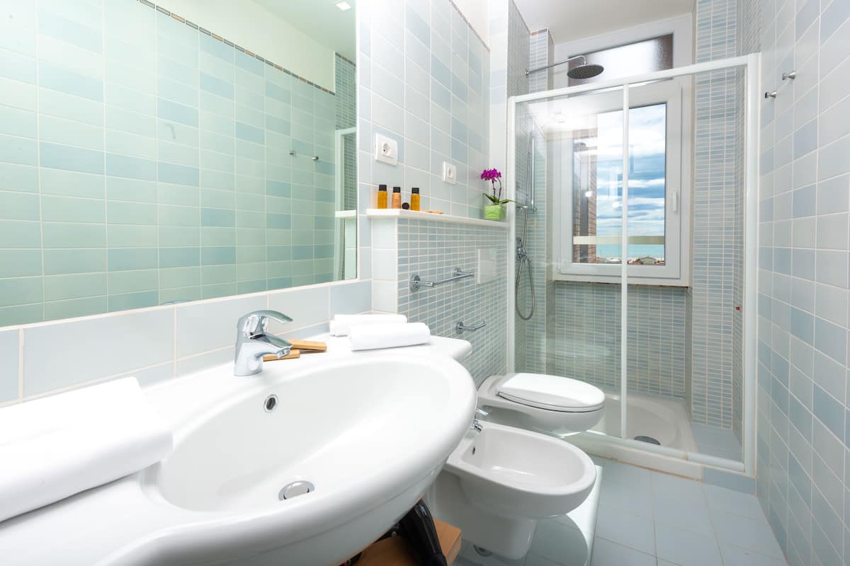 superior room, 1 queen bed, balcony, sea view | bathroom | shower, free toiletries, hair dryer, bidet