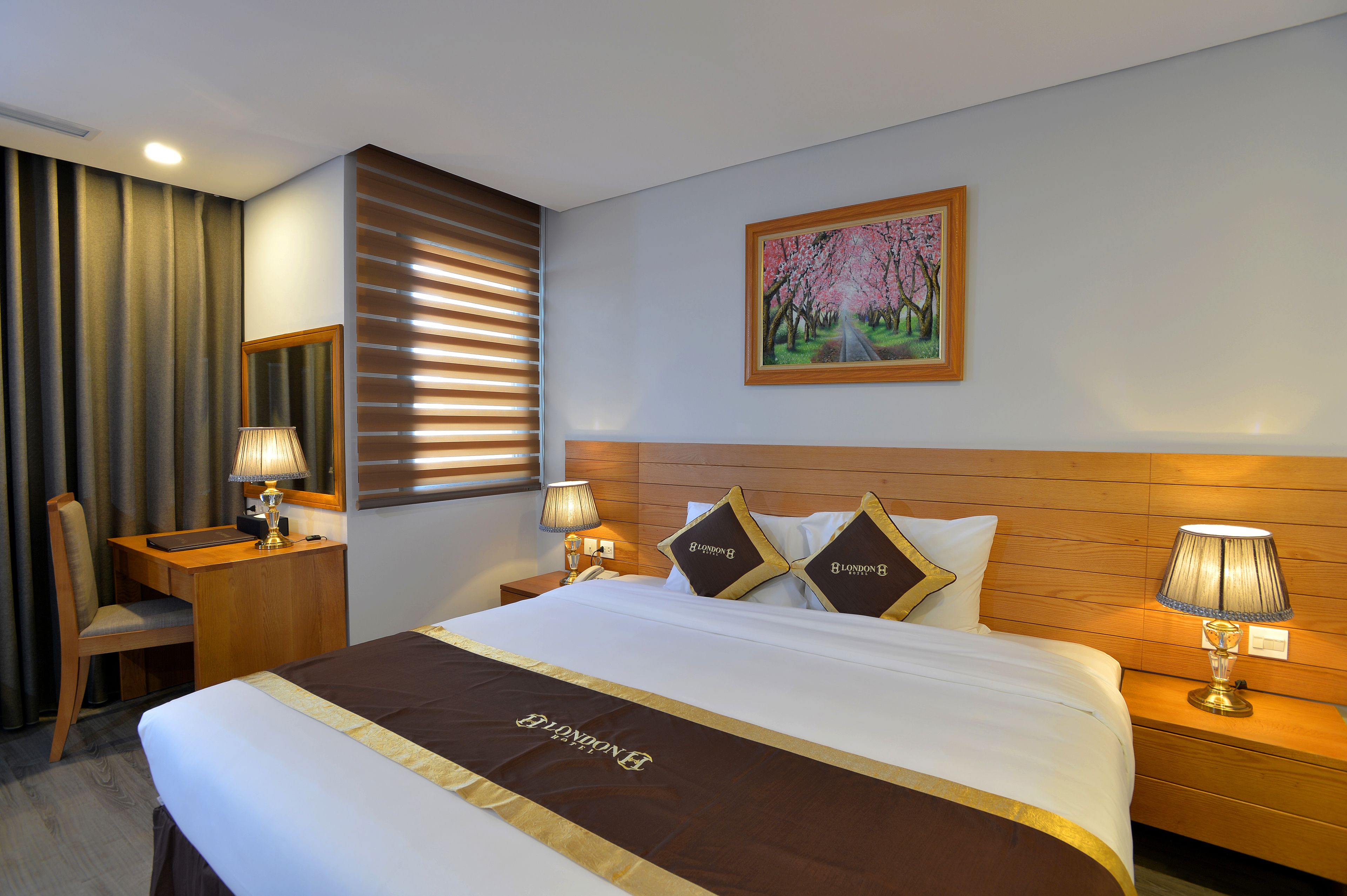 senior double room, multiple beds, city view | minibar, in-room safe, desk, blackout curtains