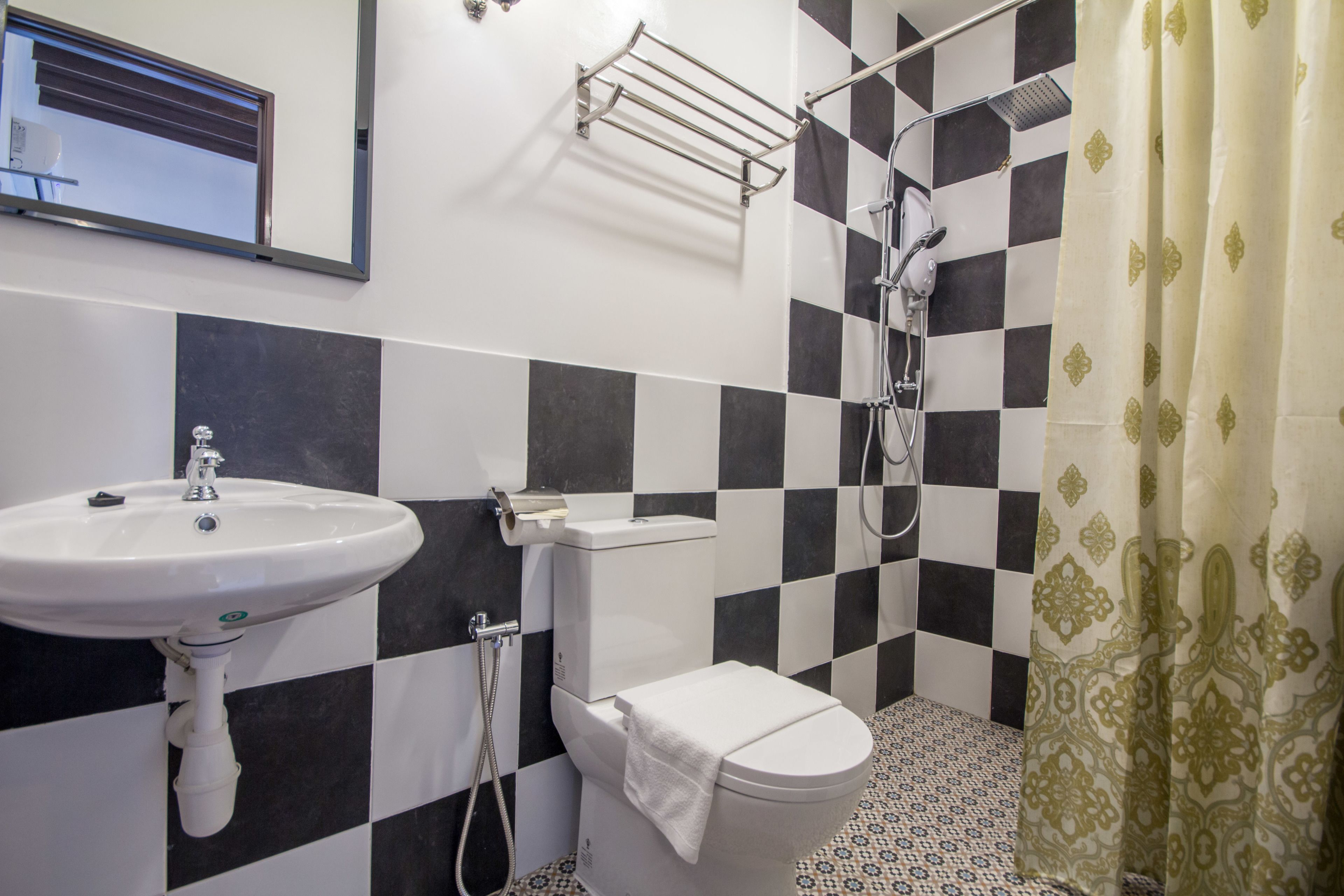 shower, rainfall showerhead, hair dryer, towels